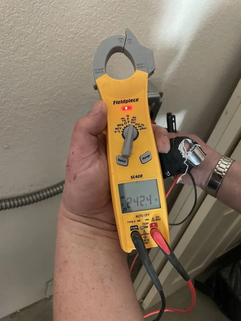 Voltage testing with clamp meter during Aluminum Wiring Replacement in Murray